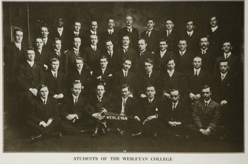 Photograph of the students of the Wesleyan Theological College in 1914. All but one of the students are white. 